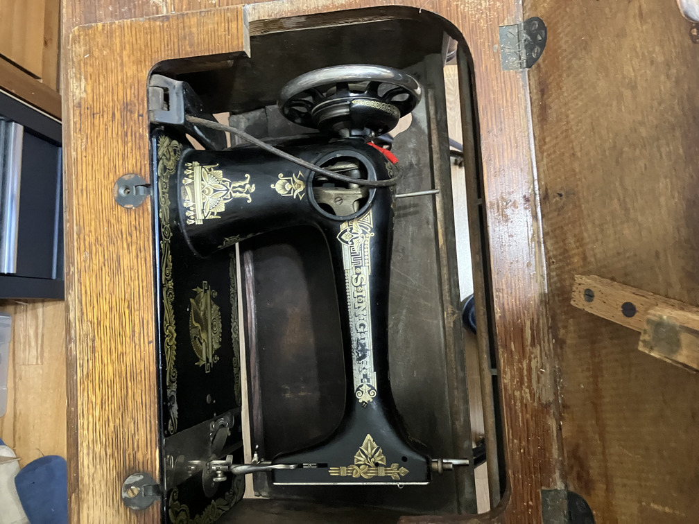 Machine lowered into cabinet